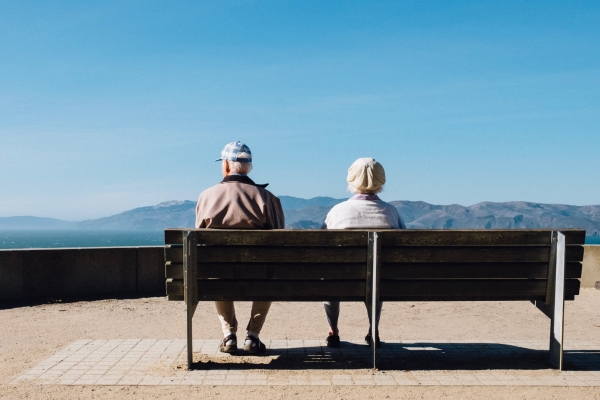 Couple sitting on a bench sightseeing